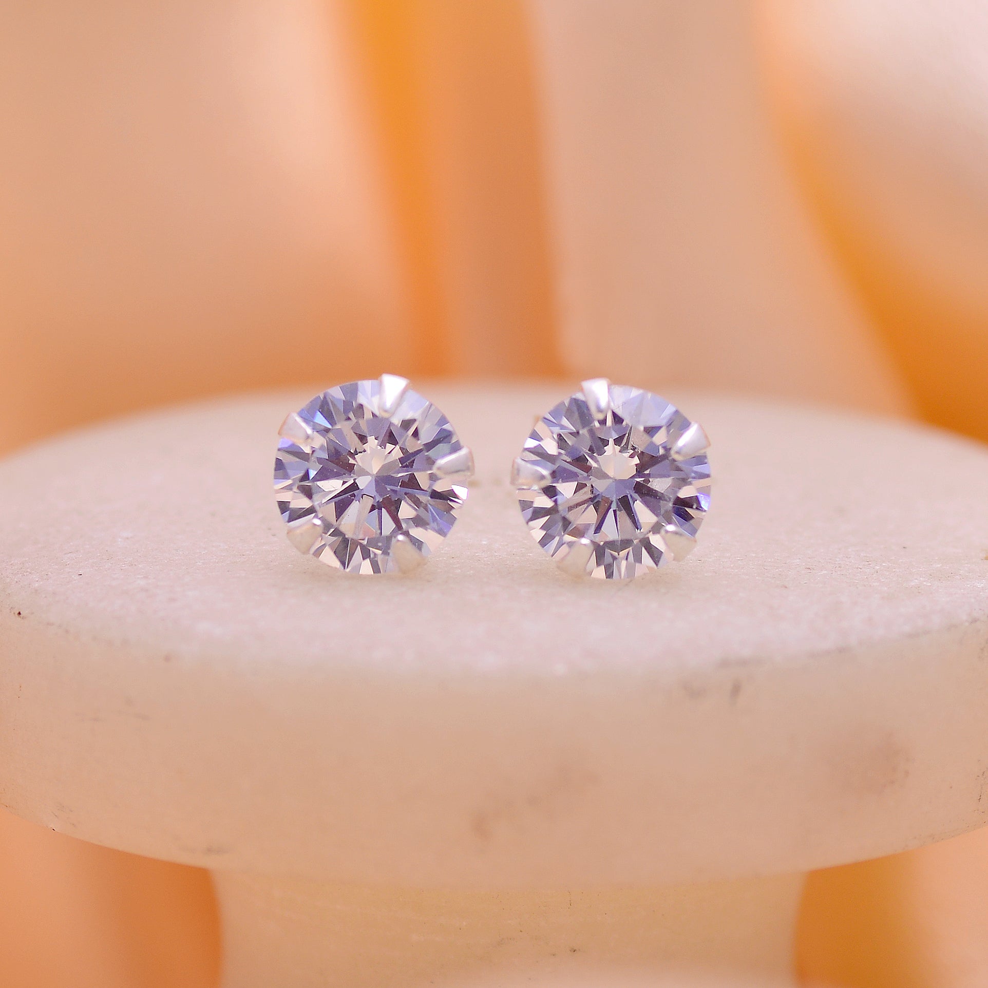 Radiant Silver Whisper Stud Earrings